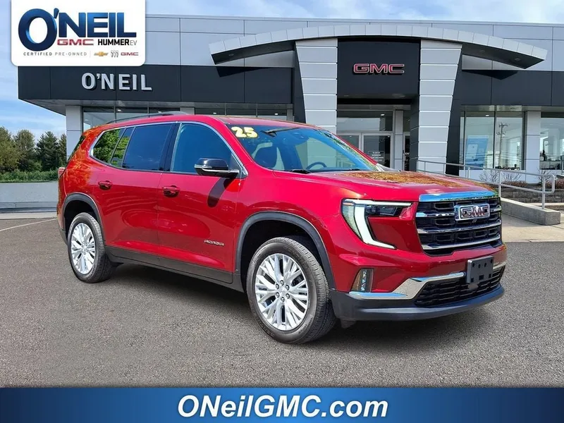 2025 GMC Acadia Elevation in Volcanic Red Tintcoat — front three-quarter view