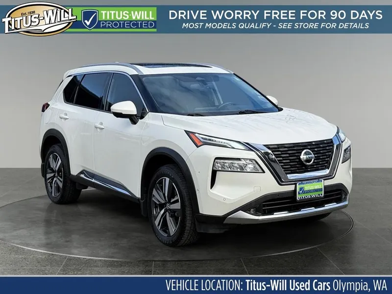 2021 Nissan Rogue Platinum in Pearl White Tricoat — front three-quarter view