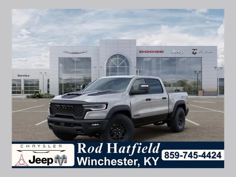2026 RAM Ram 1500 RAM 1500 RHO CREW CAB 4X4 5'7' BOX in Silver Zynith Exterior Paint — front three-quarter view