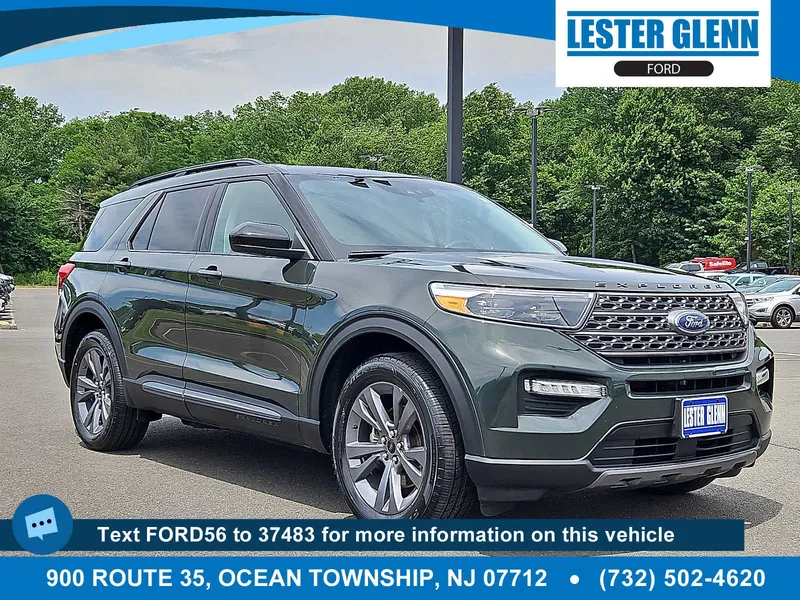 2022 Ford Explorer XLT in Forged Green Metallic — front three-quarter view