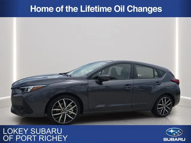 2026 Subaru Impreza Sport in Magnetite Gray Metallic — front three-quarter view