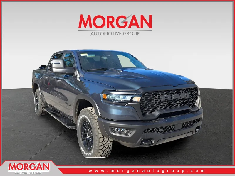2026 Ram 1500 Rebel in Forged Blue Metallic — front three-quarter view