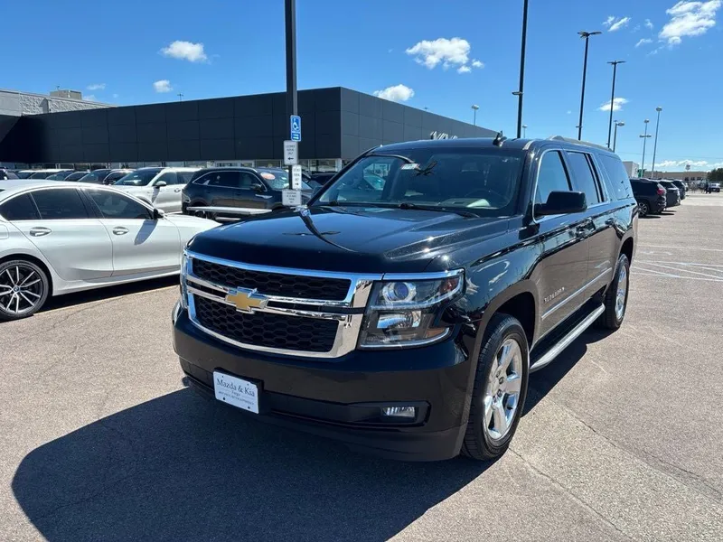 2016 Chevrolet Suburban LT in Black — front three-quarter view