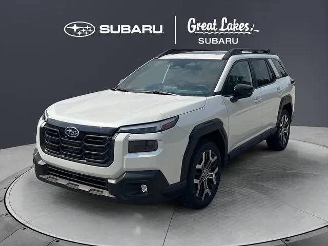 2026 Subaru OUTBACK Touring XT in Crystal White Pearl — front three-quarter view