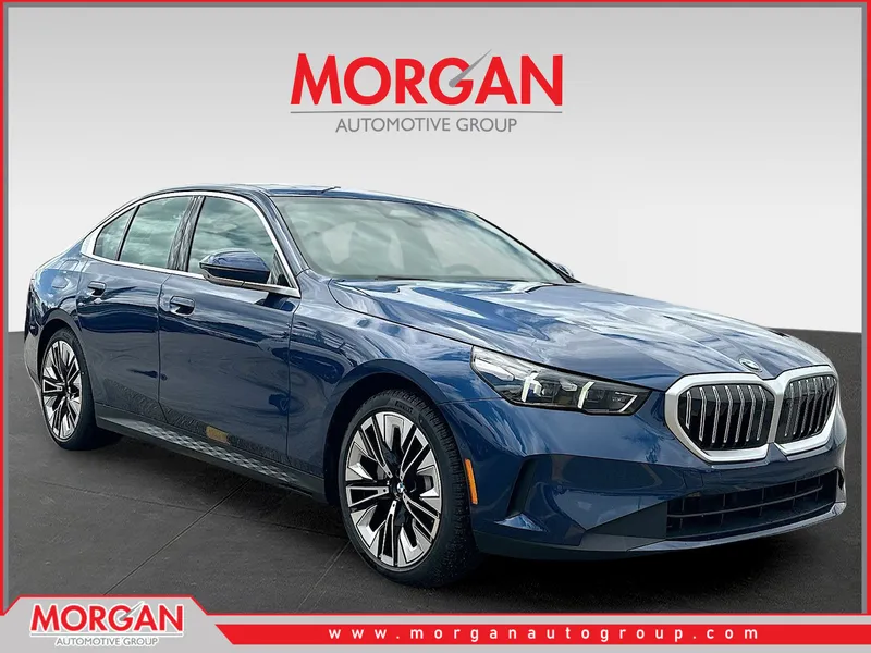 2026 BMW 5 Series 530i in Phytonic Blue Metallic — front three-quarter view