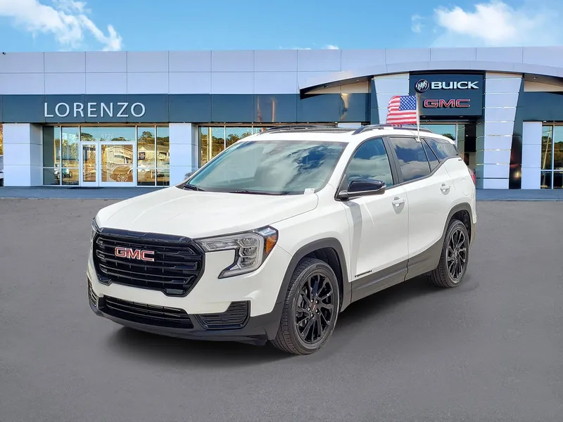2023 GMC Terrain SLE in Summit White — front three-quarter view