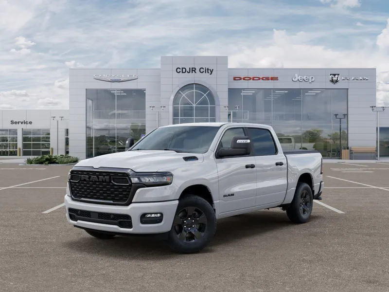 2025 RAM 1500 RAM 1500 TRADESMAN CREW CAB 4X4 5'7' BOX in Bright White Clearcoat — front three-quarter view