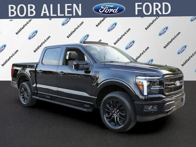 2026 Ford F-150 Lariat in Black Metallic — front three-quarter view