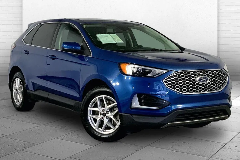 2024 Ford Edge SEL in Atlas Blue — front three-quarter view