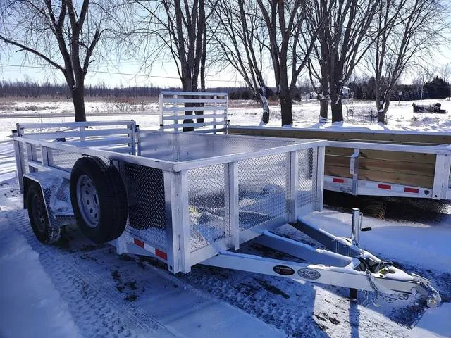 2026 MMT 6x12 SA, 2' ATP Sides,Bi-Fold Ramp, Torsion Axle — front three-quarter view