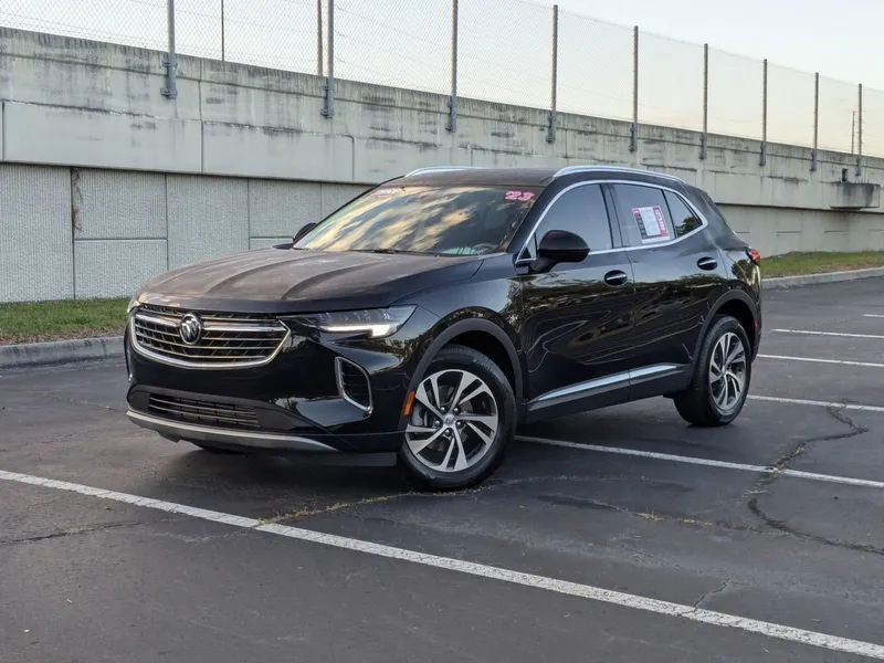 2023 Buick Envision FWD 4dr Essence in Ebony Twilight Metallic — front three-quarter view