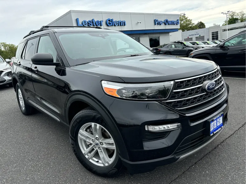 2023 Ford Explorer XLT in Agate Black — front three-quarter view
