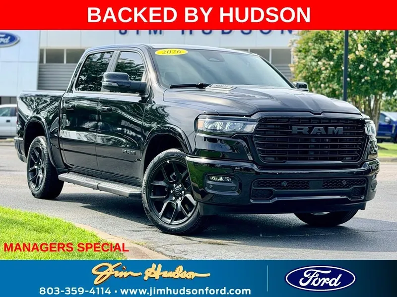 2026 RAM 1500 Laramie in Diamond Black — front three-quarter view