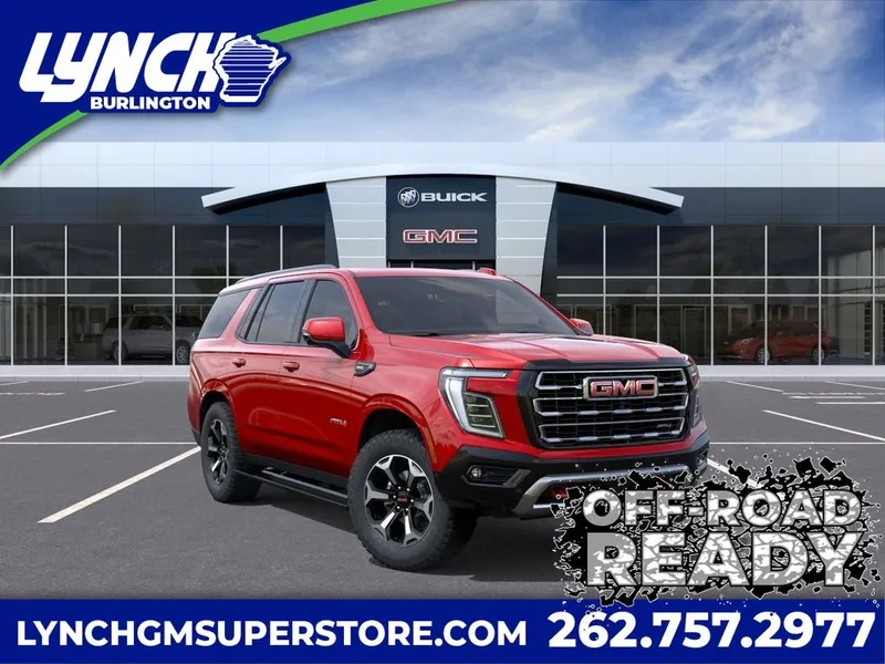 2026 GMC Yukon AT4 in Volcanic Red Tintcoat — front three-quarter view