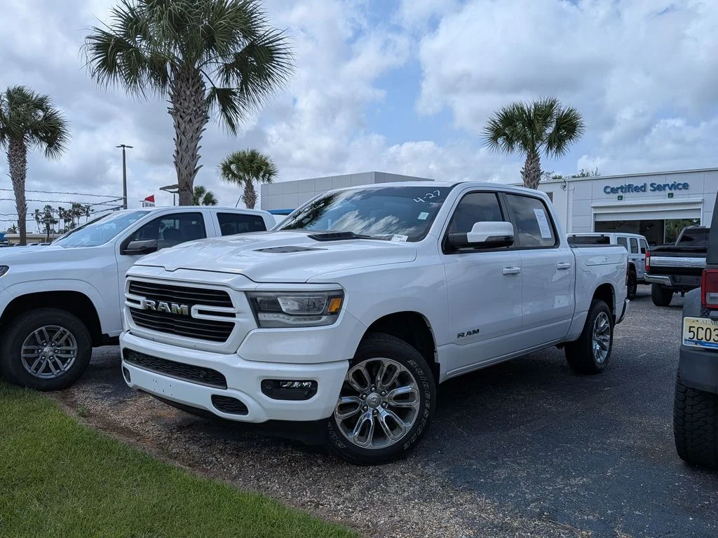 2023 Ram 1500 Laramie in White — front three-quarter view