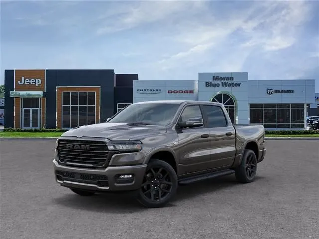 2026 RAM Ram 1500 RAM 1500 LARAMIE CREW CAB 4X4 5'7' BOX in Granite Crystal Metallic Clear-Coat Exterior Paint — front three-quarter view