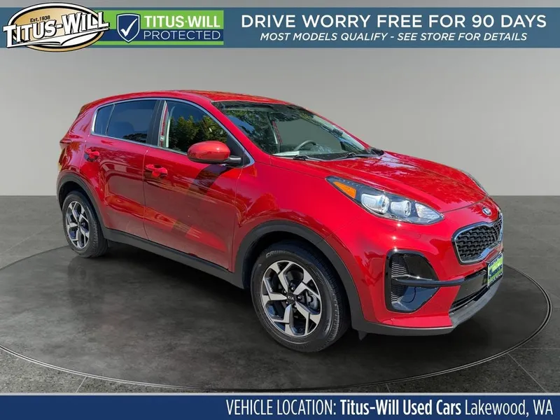 2020 Kia Sportage LX in Red — front three-quarter view