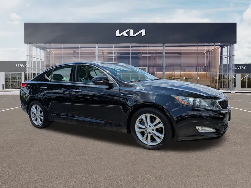 2012 Kia Optima EX in Ebony Black — front three-quarter view
