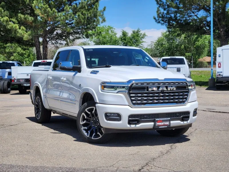 2026 RAM 1500 RAM 1500 LIMITED CREW CAB 4X4 5'7' BOX in Ivory White Tri-Coat Pearl-Coat Exterior Paint — front three-quarter view