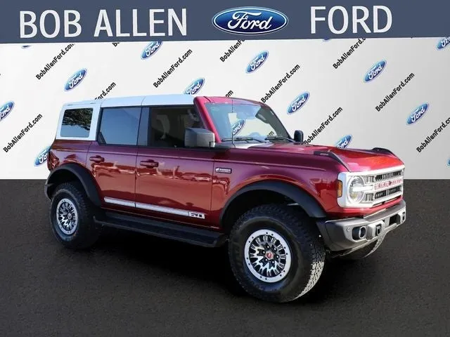 2026 Ford Bronco Outer Banks in Ruby Red — front three-quarter view