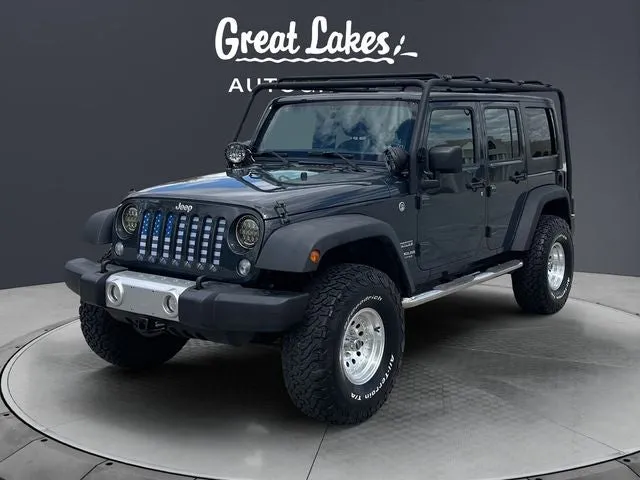 2017 Jeep Wrangler Unlimited Sport in Rhino Clearcoat — front three-quarter view