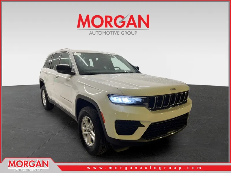 2025 Jeep Grand Cherokee Laredo in Bright White Clearcoat — front three-quarter view