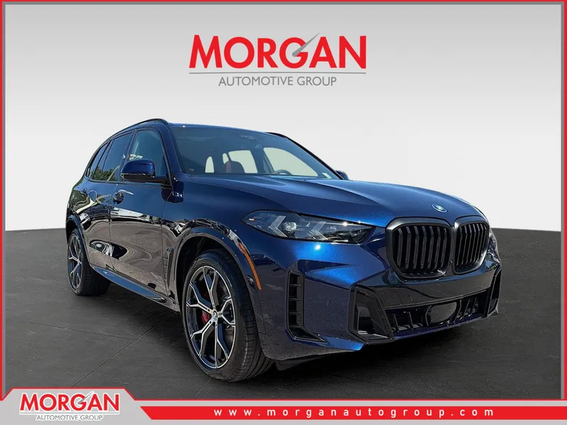 2026 BMW X5 xDrive50e in Tanzanite Blue II Metallic — front three-quarter view