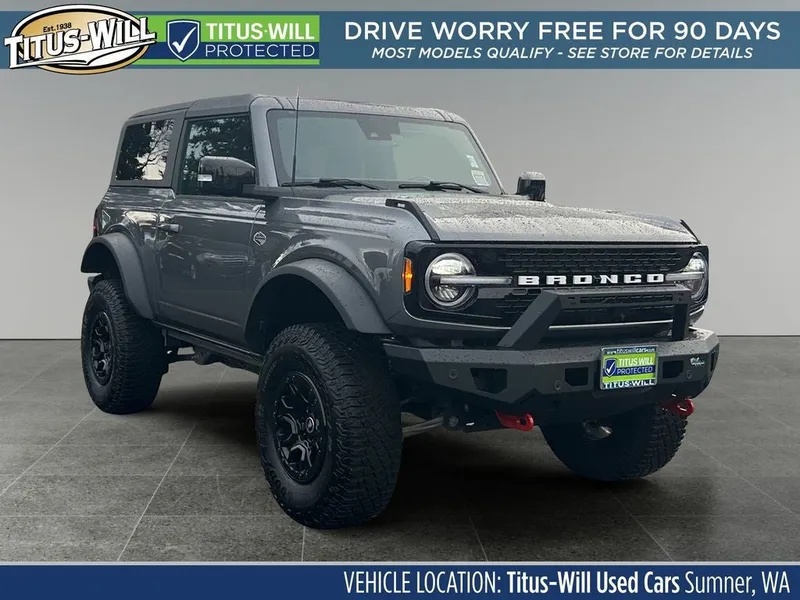 2021 Ford Bronco Wildtrak *Lifted* in Lightning Blue Metallic — front three-quarter view