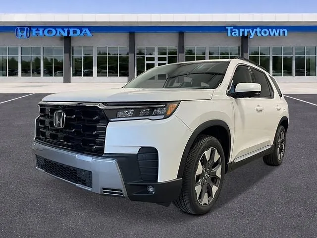 2026 Honda Pilot AWD Elite in Platinum White Pearl — front three-quarter view