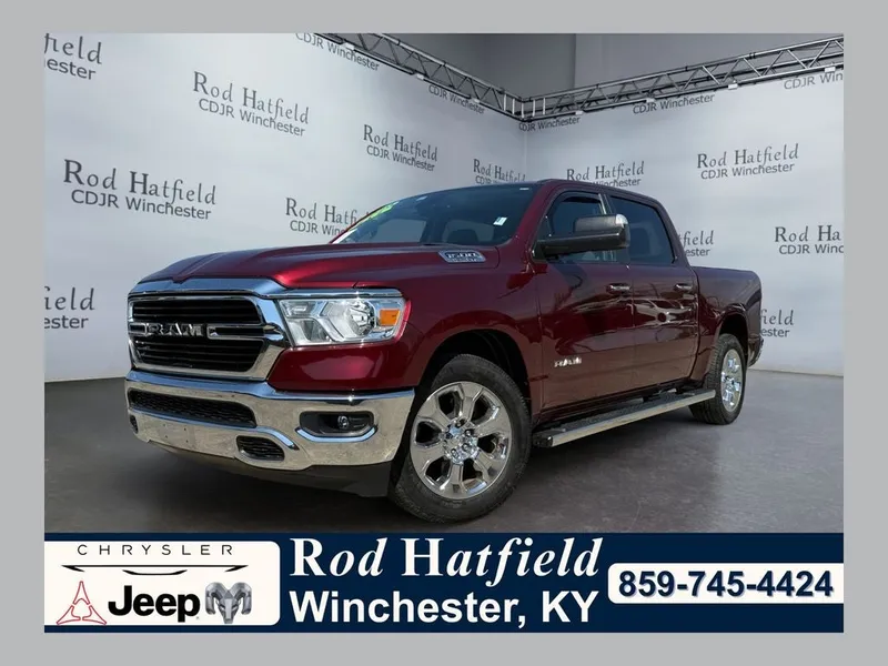 2020 RAM 1500 Big Horn Crew Cab 4x4 5'7' Box in Delmonico Red Pearlcoat — front three-quarter view