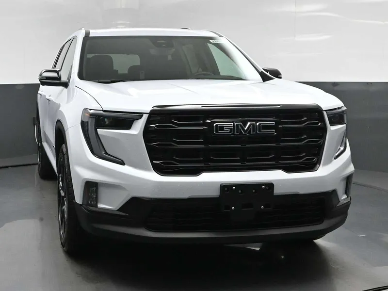 2026 GMC Acadia Elevation in Glacier White Tricoat — front three-quarter view