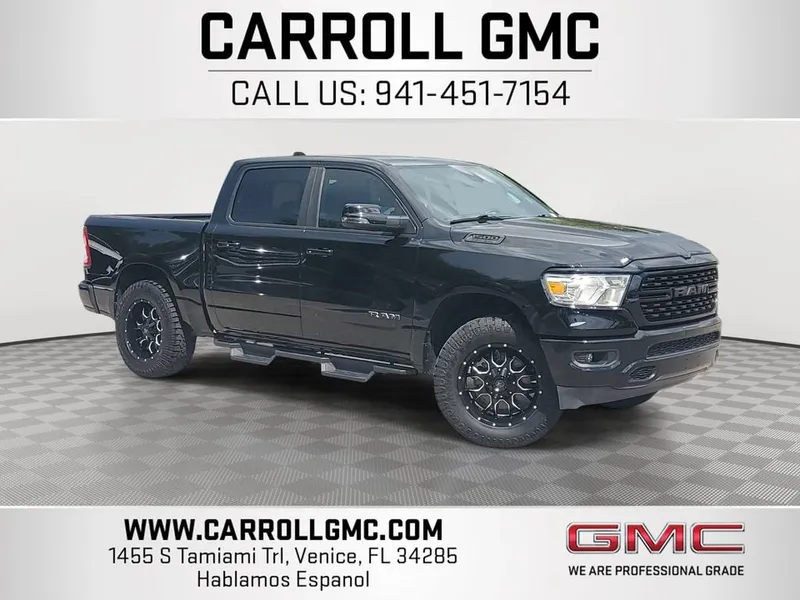 2023 RAM 1500 Big Horn Crew Cab 4x4 5'7" Box in Black — front three-quarter view