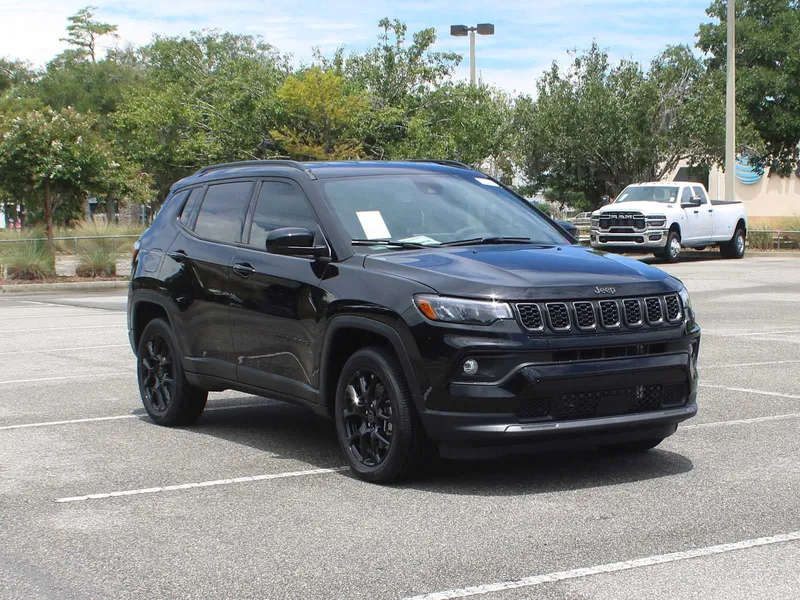 2026 Jeep Compass Latitude Altitude in Diamond Black Crystal Pearl-Coat Exterior Paint — front three-quarter view