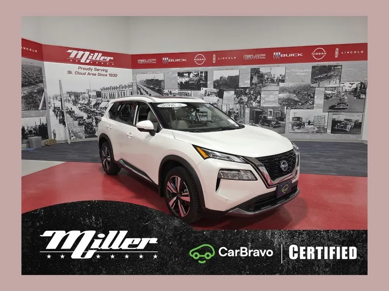 2023 Nissan Rogue SL Carbravo CPO in Pearl White Tricoat — front three-quarter view