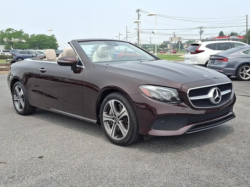 2019 Mercedes-Benz E-Class E 450 4MATIC® Cabriolet in Rubellite Red — front three-quarter view