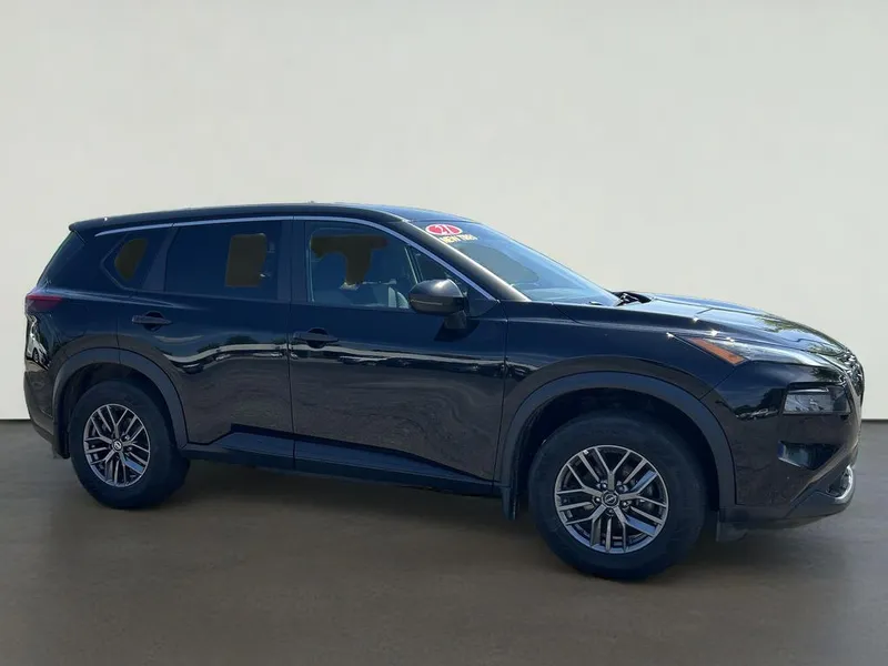 2021 Nissan Rogue S Intelligent AWD in Black — front three-quarter view