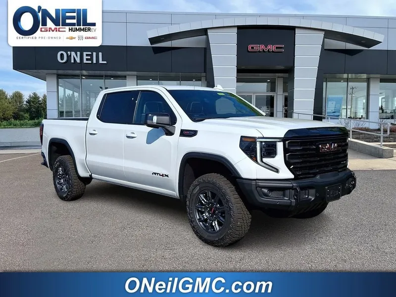 2026 GMC Sierra 1500 AT4X in Summit White — front three-quarter view