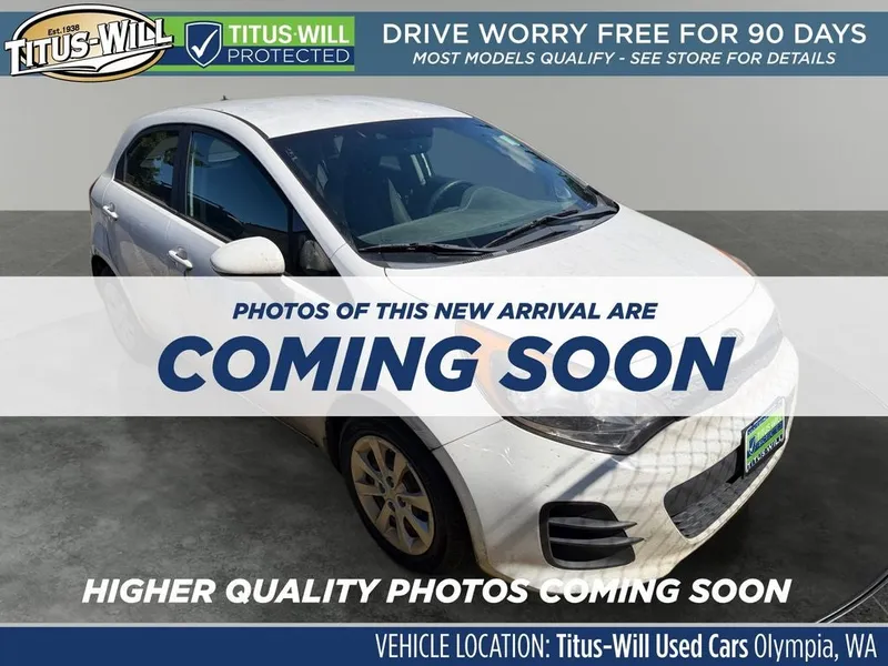 2016 Kia Rio LX in Clear White — front three-quarter view