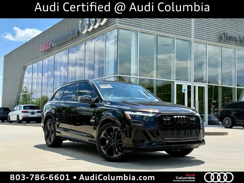 2026 Audi Q7 55 Premium Plus quattro in Tamarind Brown Metallic — front three-quarter view