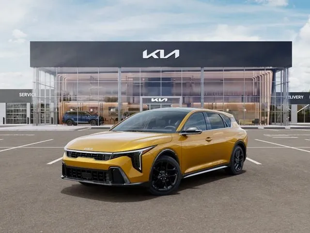 2026 Kia K4 GT-Line Turbo ETA - JUL. 2026 in Sparkling Yellow — front three-quarter view