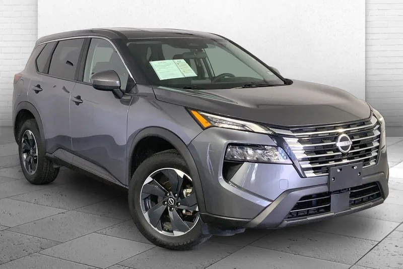 2025 Nissan Rogue SV in Gun Metallic — front three-quarter view