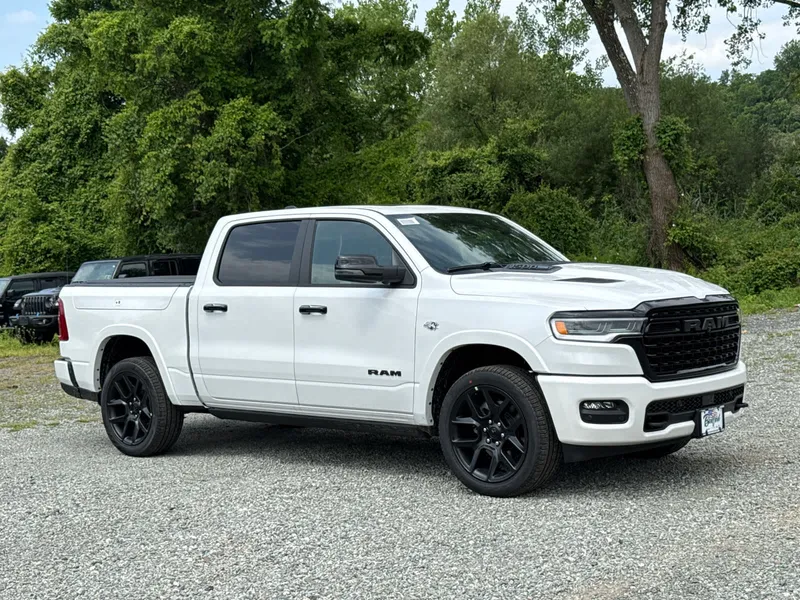 2026 RAM 1500 Limited in Ivory White Tri-Coat Pearlcoat — front three-quarter view