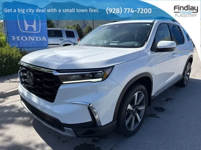 2024 Honda Pilot Touring in Platinum White Pearl — front three-quarter view