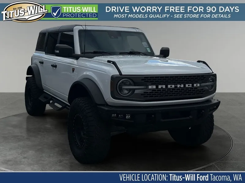 2023 Ford Bronco Badlands in Oxford White — front three-quarter view