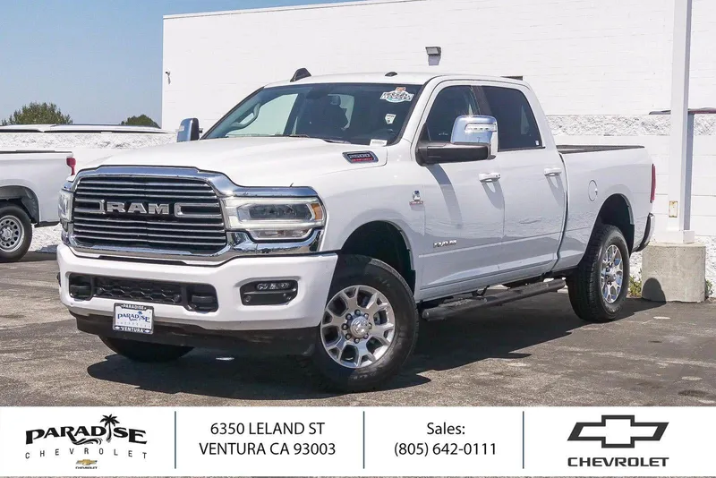 2024 RAM 2500 Laramie in Bright White Clea — front three-quarter view