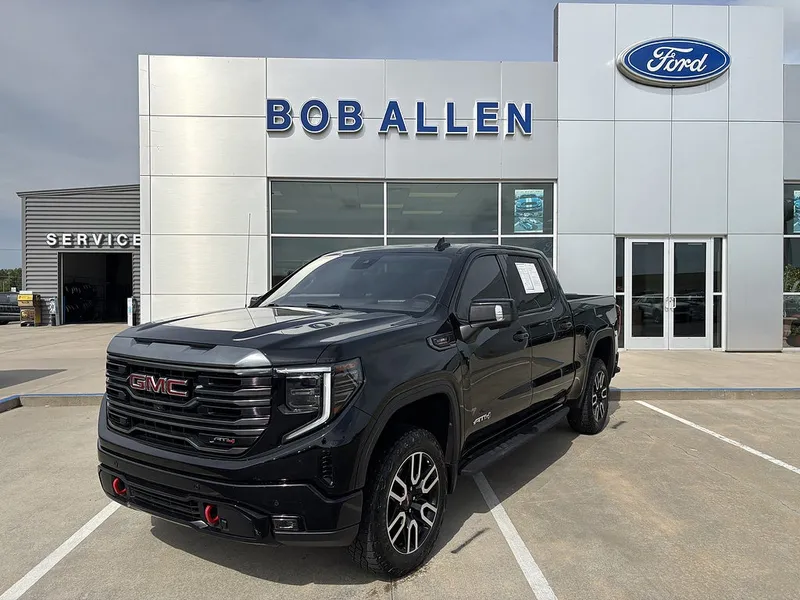 2024 GMC Sierra 1500 AT4 in Onyx Black — front three-quarter view