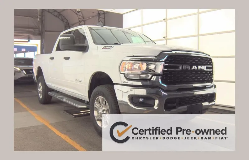 2024 RAM 2500 Big Horn Crew Cab 4x4 6'4' Box in Bright White Clearcoat — front three-quarter view