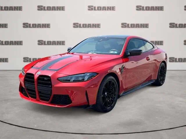 2027 BMW M4 Competition in Toronto Red Metallic — front three-quarter view