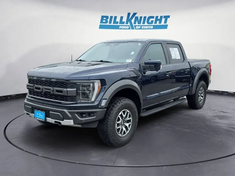 2023 Ford F-150 Raptor in Blue Metallic — front three-quarter view