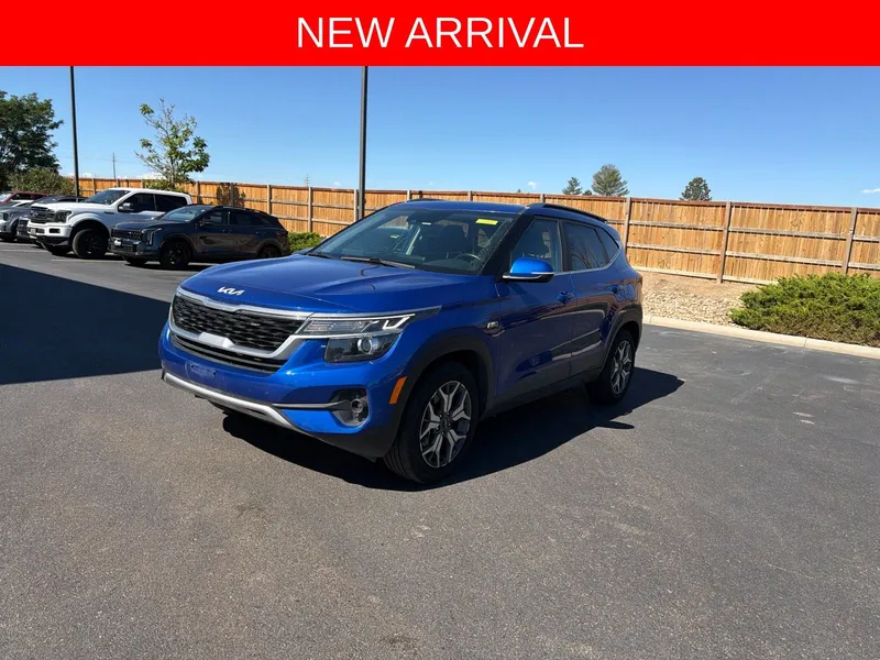 2022 Kia Seltos EX AWD in Neptune Blue — front three-quarter view